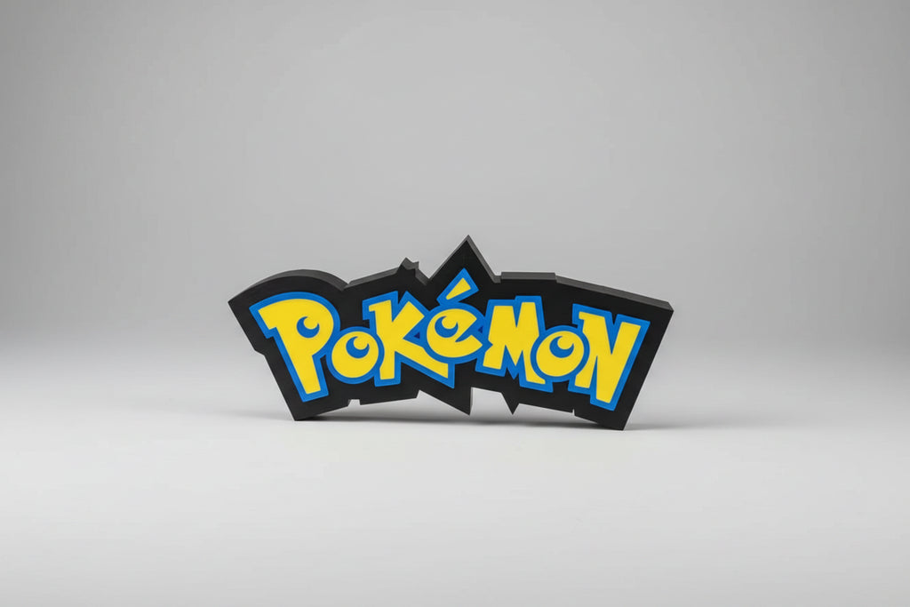 Pokémon logo on a circular metal object with visible wires in the background